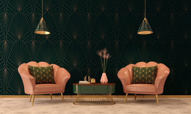 un salon art déco avec fauteuils roses et papier peint géométrique
