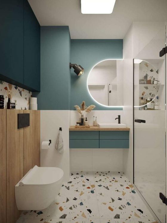 zellige au sol pour aménager une petite salle de bains aux murs vert canard