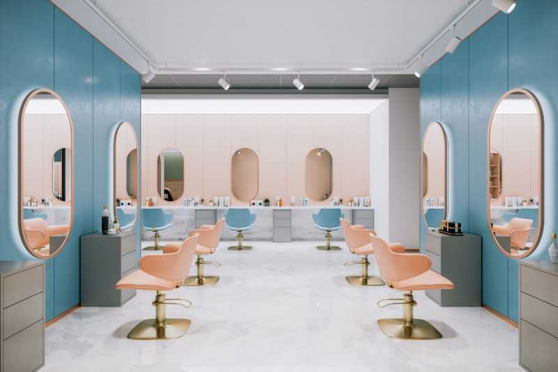 déco salon de coiffure vintage dans des tons pastel avec mobilier et miroirs flashy